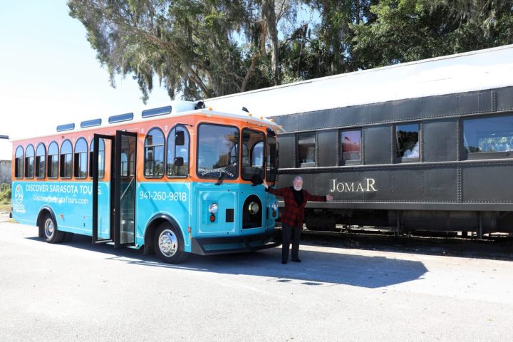 Bob on Circus Secrets Tour in front of JOMAR & Trolley