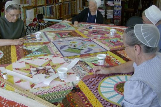 a group of people sitting at a table