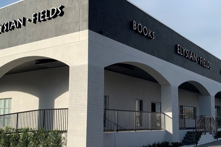 Elysian Fields store exterior with arched facade, books and gifts signage.