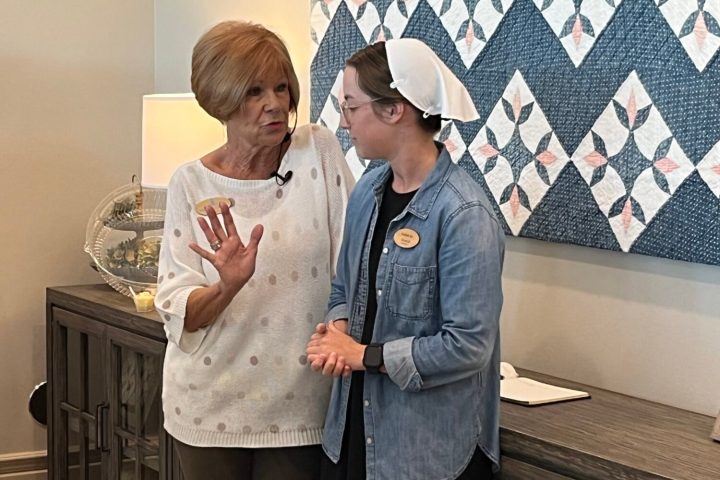 a woman standing in a room