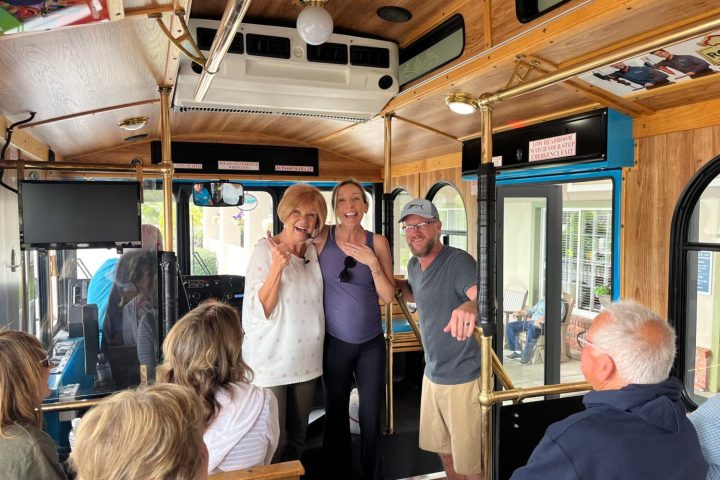 a group of people standing in front of a building