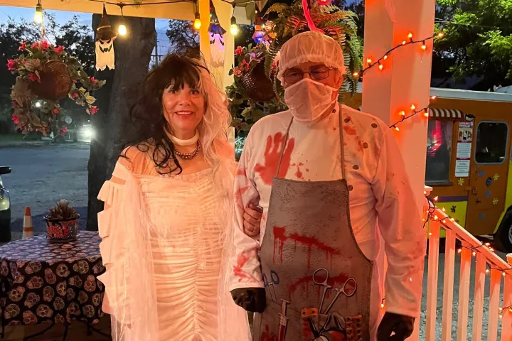 a person standing in front of a building