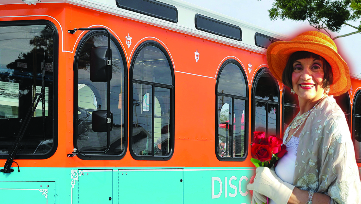 a person standing in front of a bus