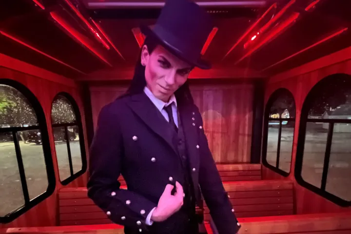 a person wearing a suit and tie