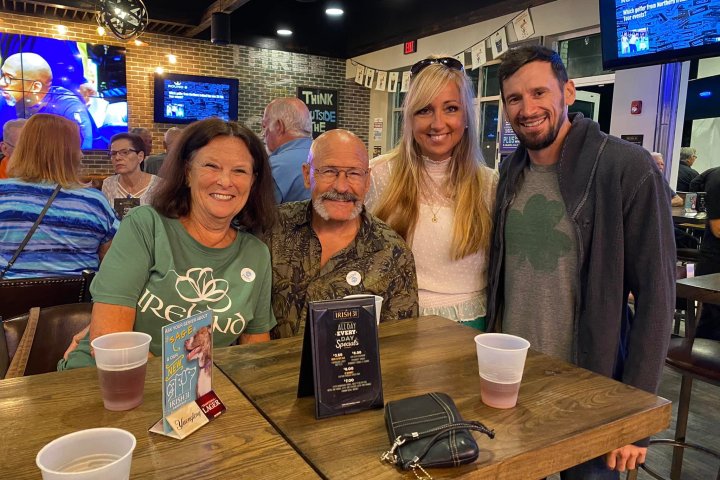 a group of people posing for the camera