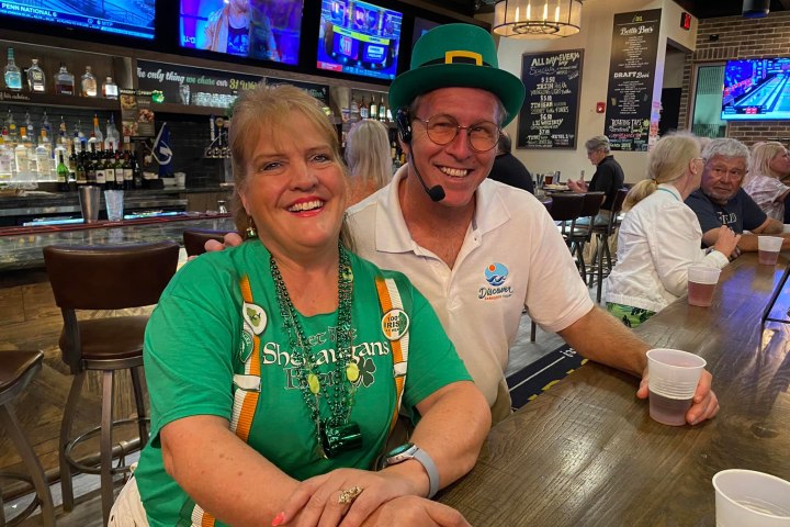 a person sitting at a table in a restaurant