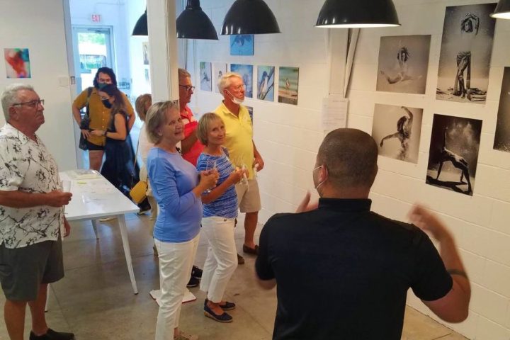 a group of people standing in a room
