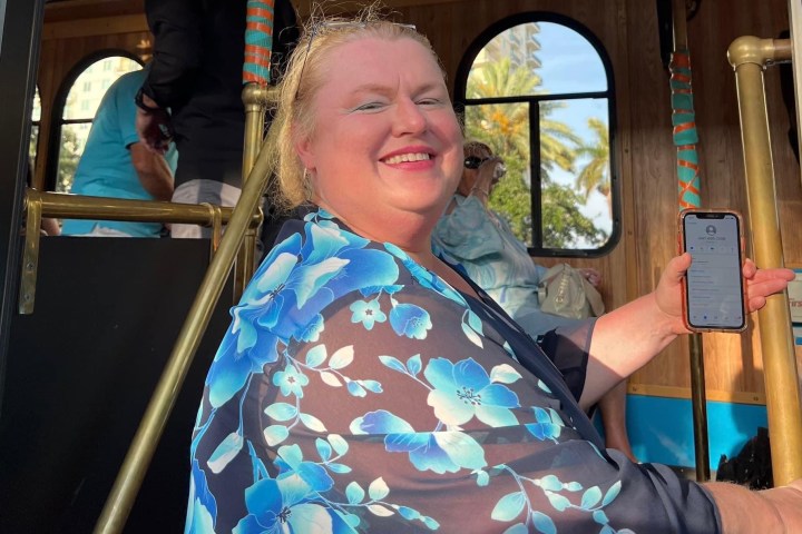 a little girl smiling at the camera