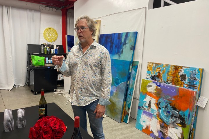 a man and a woman standing in a room