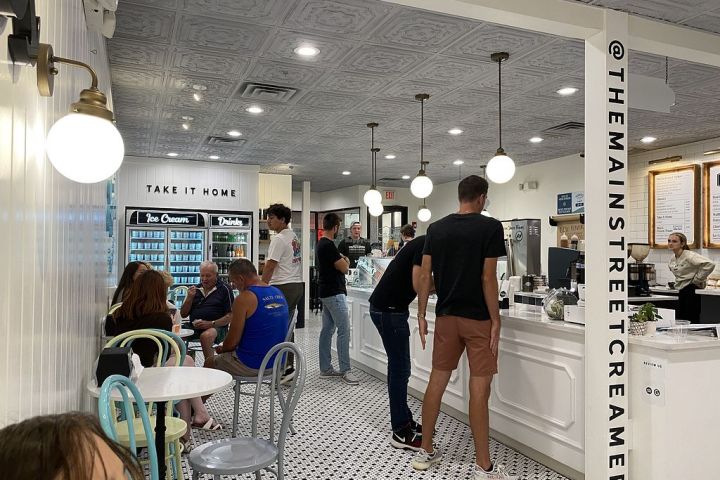 a group of people standing in a room