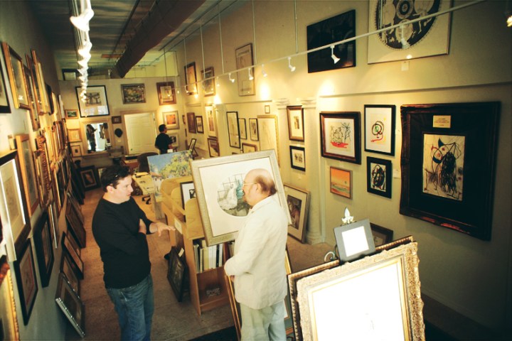 a group of people standing in a room