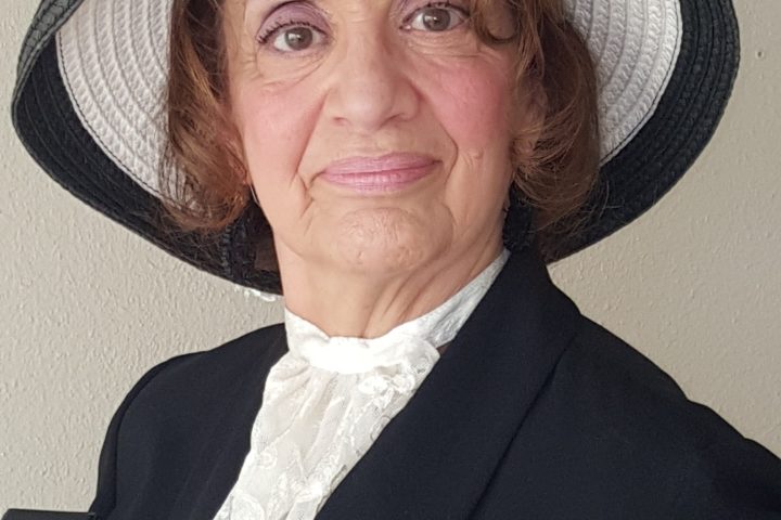 a person wearing a suit and tie