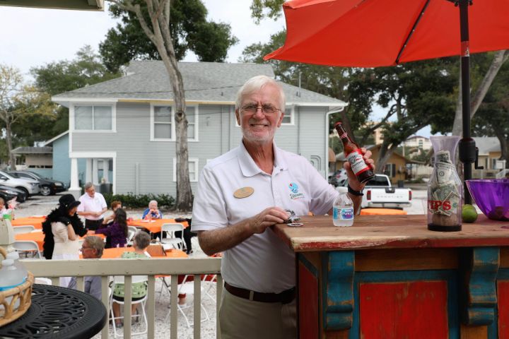a man cooking food on a table