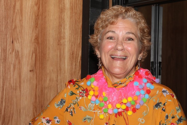 a person smiling for the camera