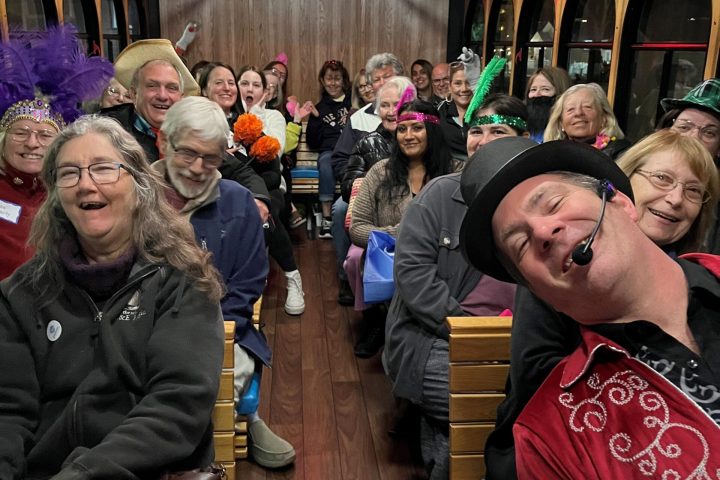 a group of people sitting at a train station