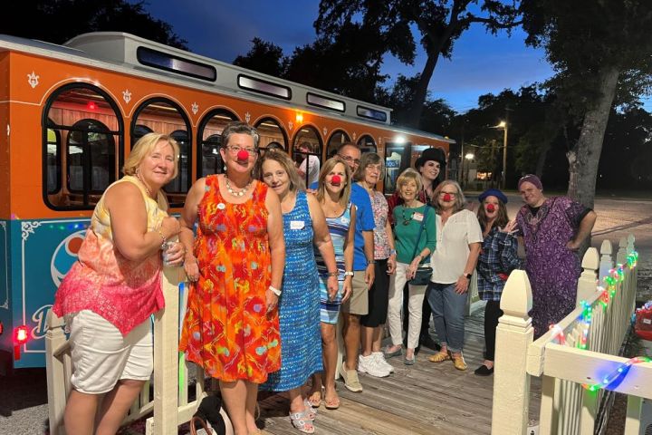 a group of people posing for the camera