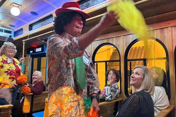 Sally Morgan et al. standing in front of a store