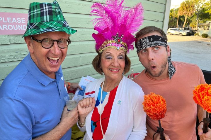 a man and a woman wearing a hat