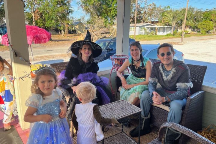 a group of people sitting posing for the camera