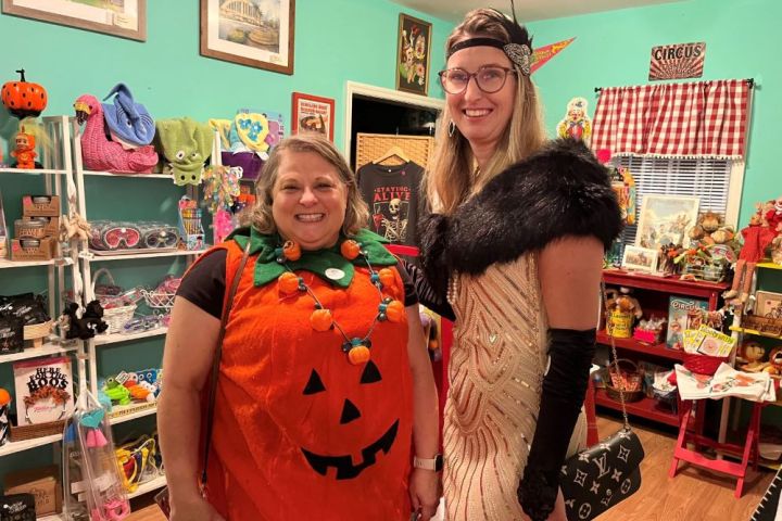 a person standing in front of a store