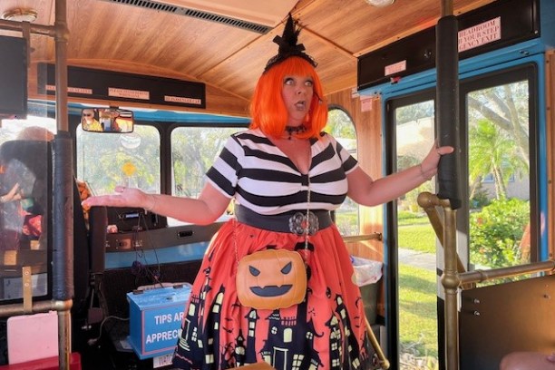 WitchyPoo leading The BooMobile trolley tour
