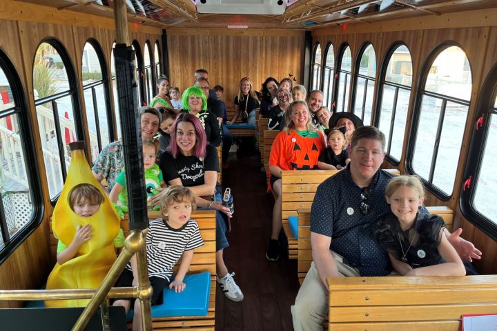 a group of people sitting on a bench