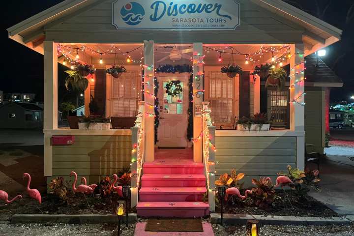 a group of people standing in front of a building