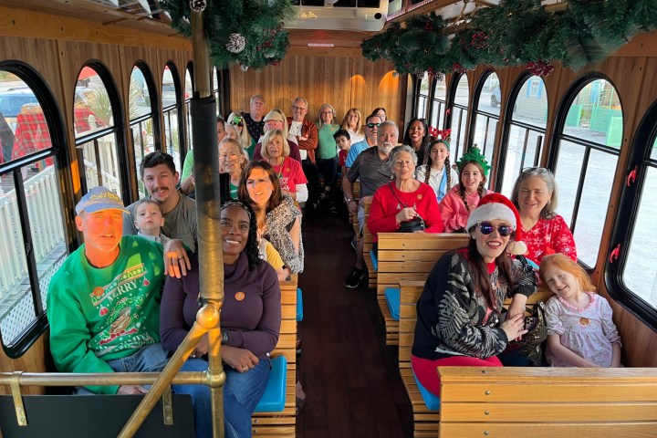 a group of people sitting on a bench
