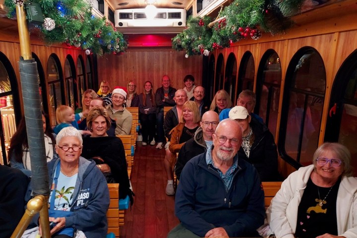 a group of people sitting posing for the camera