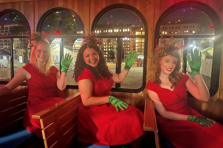 a group of people sitting on a bus