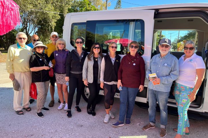 a group of people posing for a photo