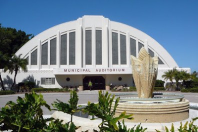 a statue in front of a building