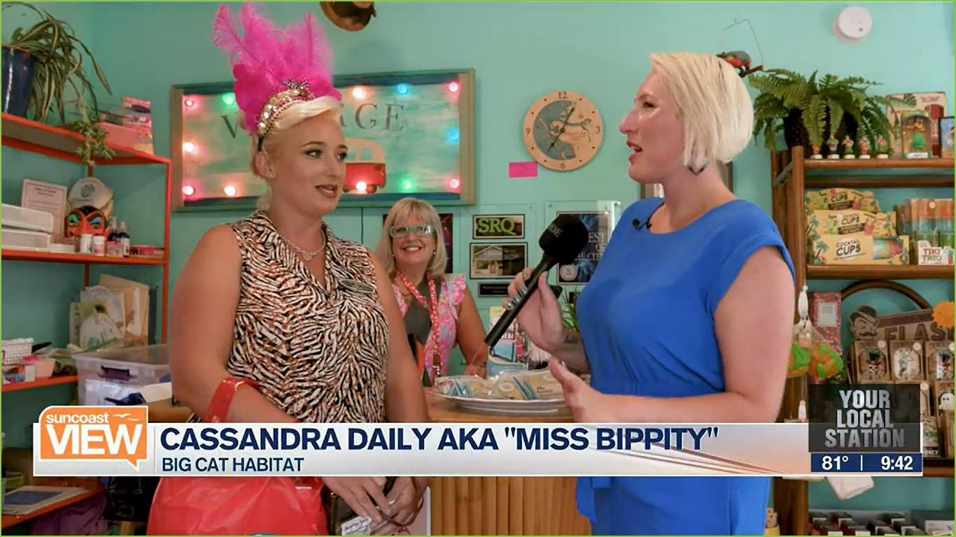 a group of people looking at a birthday party