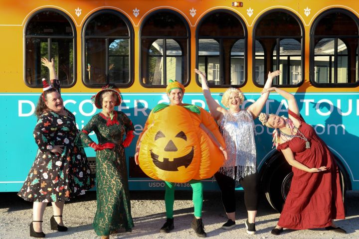 a group of people posing for the camera