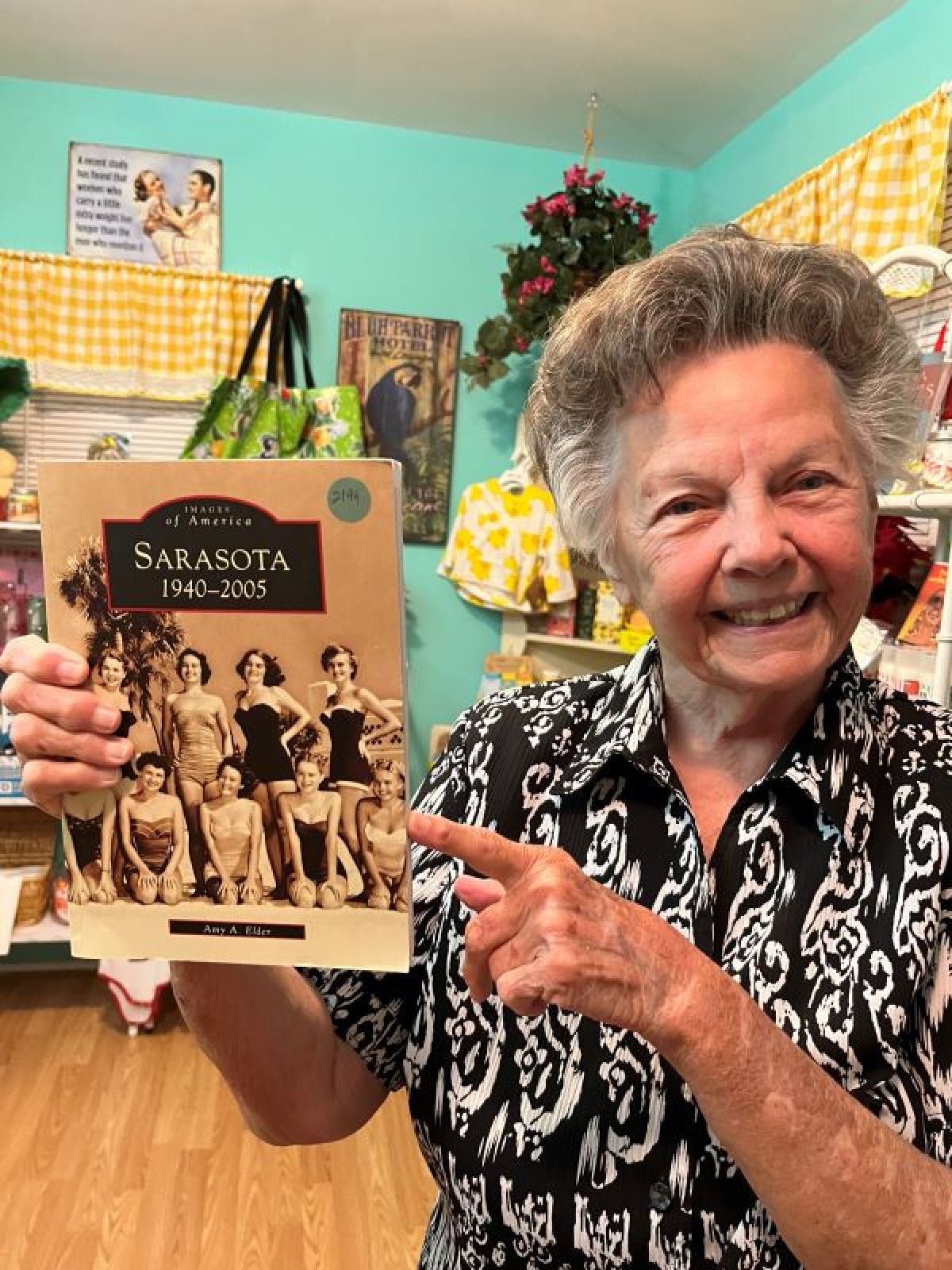 a man holding a birthday cake
