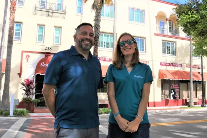 a person standing in front of a building
