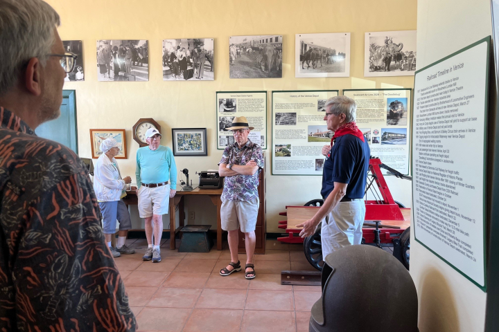 a group of people standing in a room