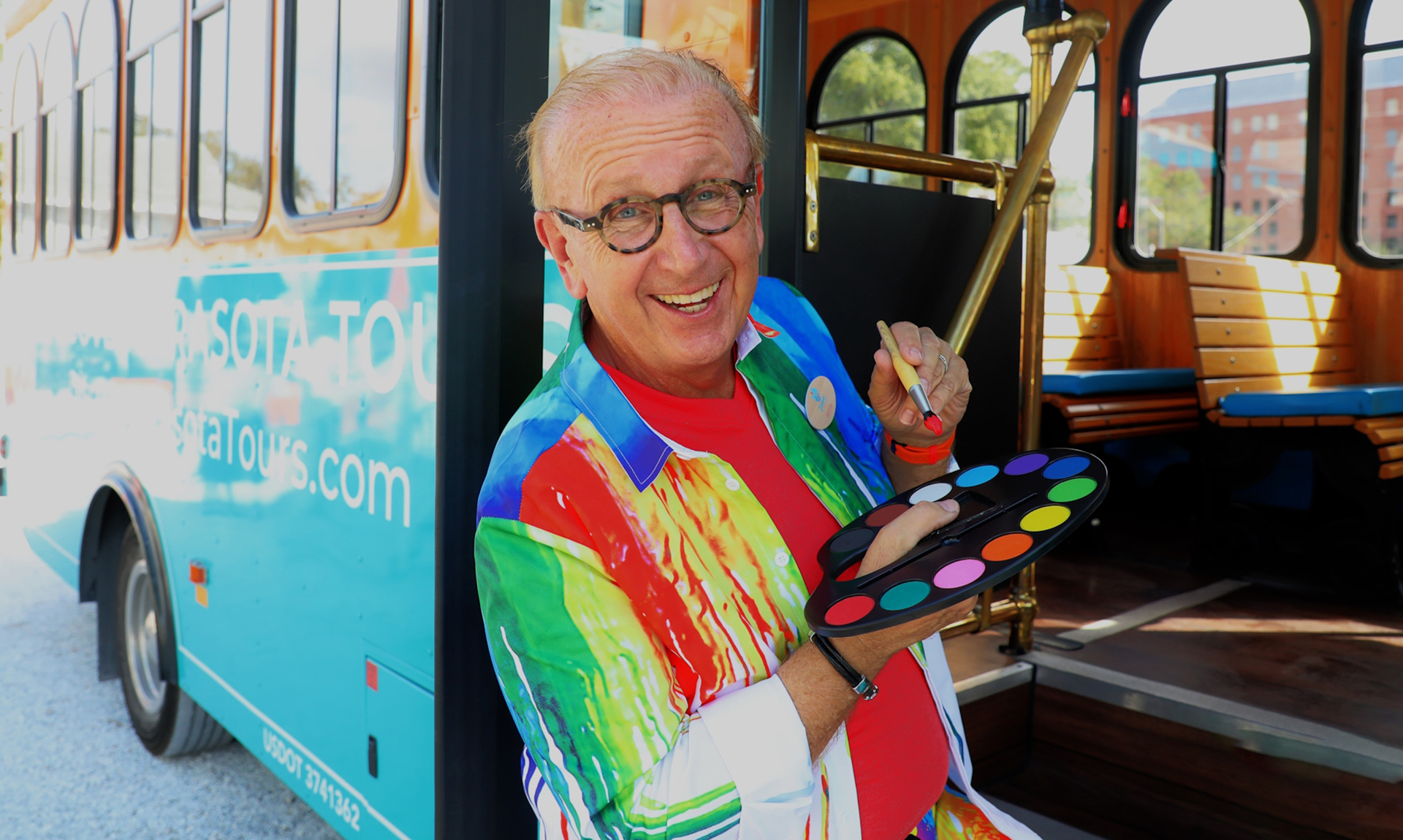 art-crawl-tour Jerry Chesley aboard Sarasota's Art Crawl Trolley.