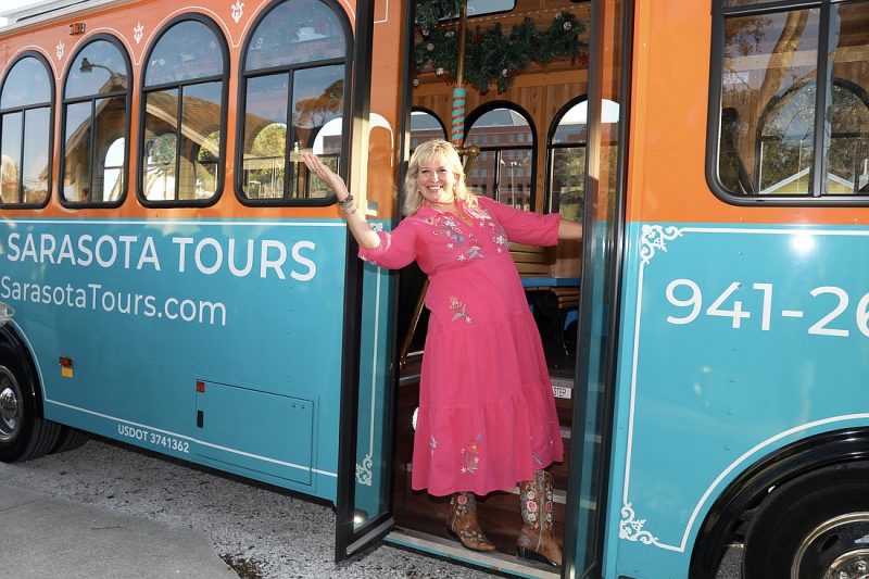 a person standing in front of a trolley