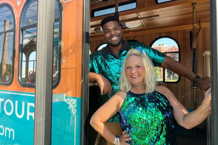 a person standing posing for the camera