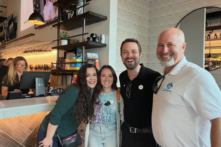 a group of people posing for the camera