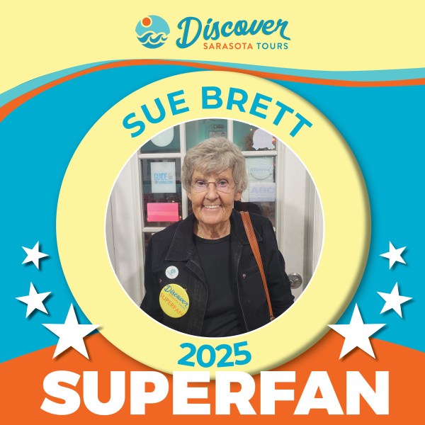 Elderly woman with glasses, smiling, labeled 'Superfan 2025' for Discover Sarasota Tours.
